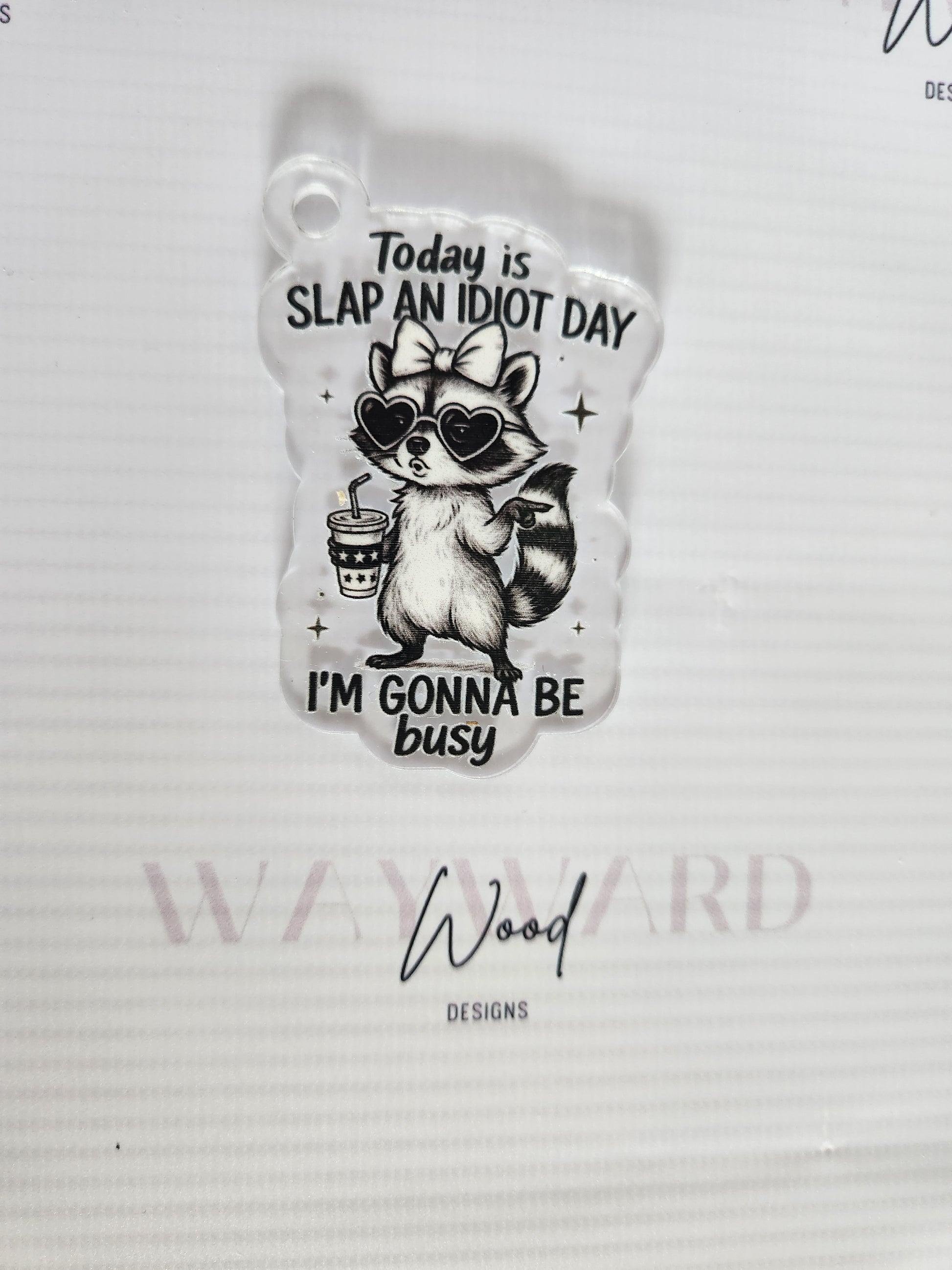 ‘Slap an Idiot Day’ Raccoon Keyring image 0