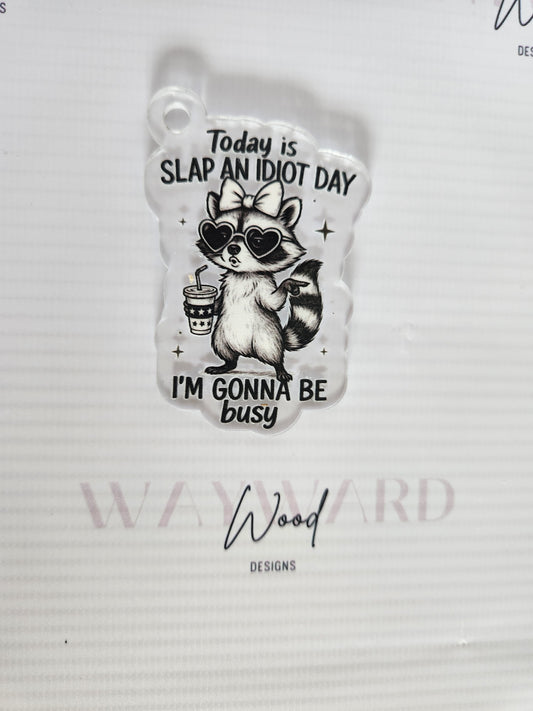‘Slap an Idiot Day’ Raccoon Keyring image 0